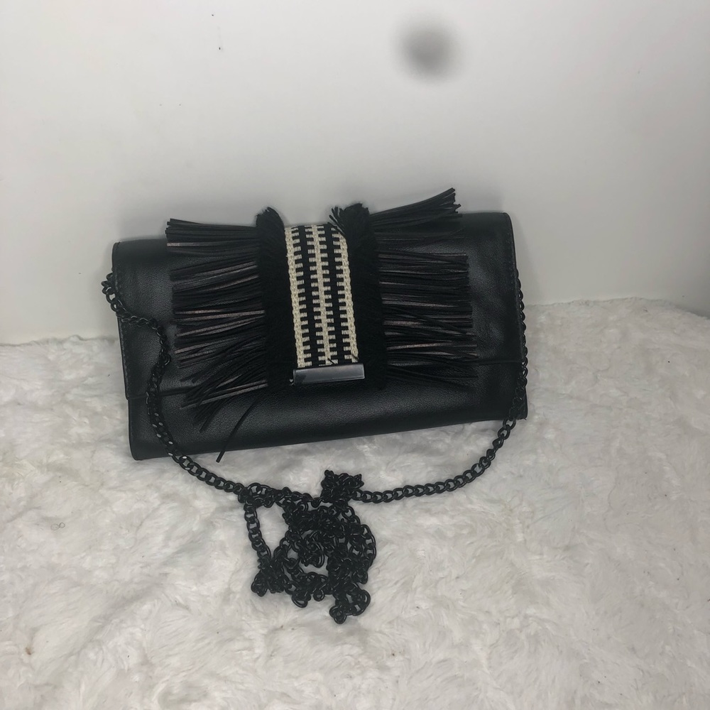 Loeffler Randall black leather with fringe envelope crossbody bag.